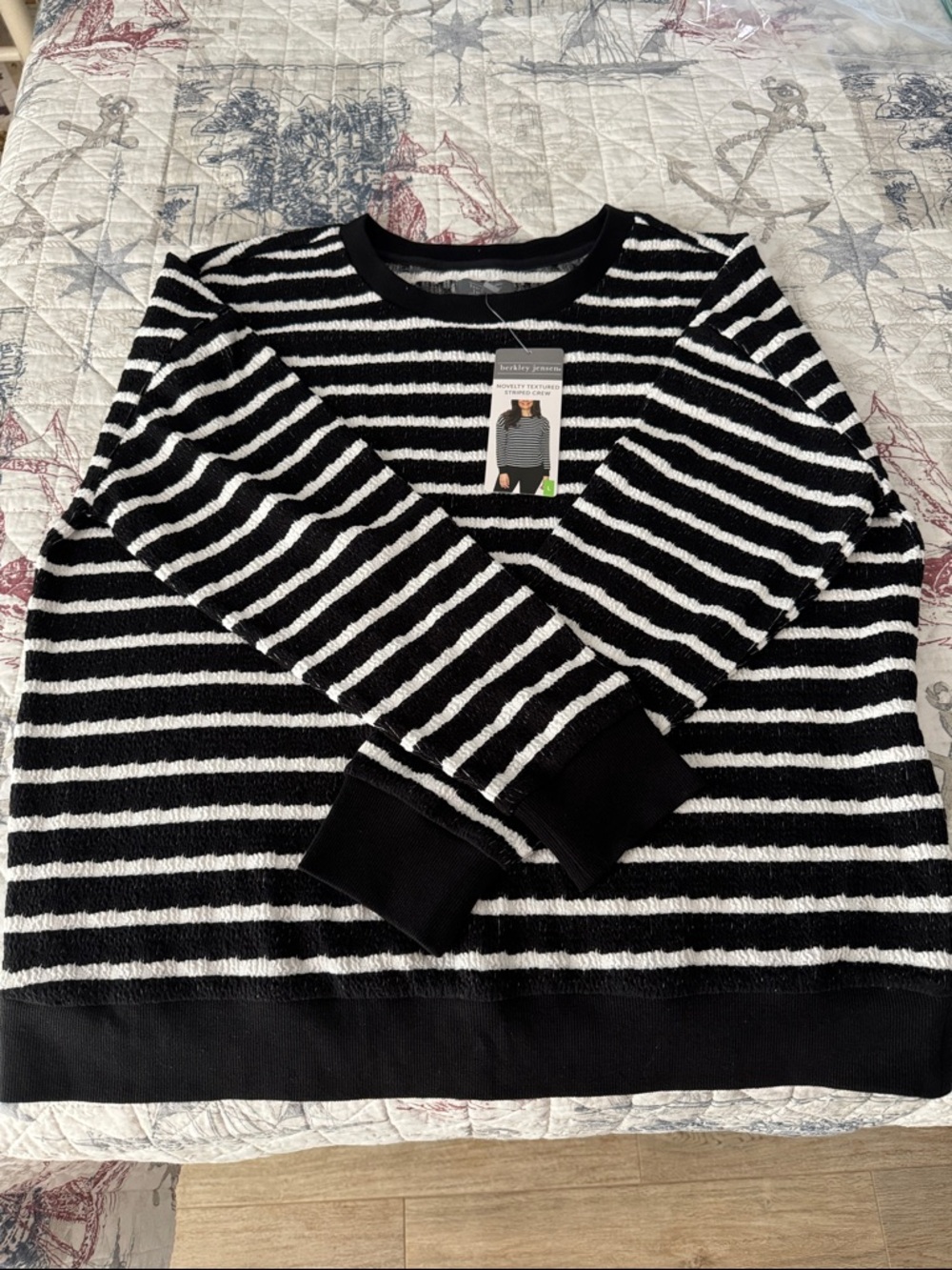 Woman’s Striped Black & White Crewneck Sweater.